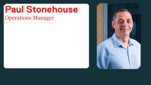 Image of man smiling with white box with red text saying "Paul Stonehouse operations manager"
